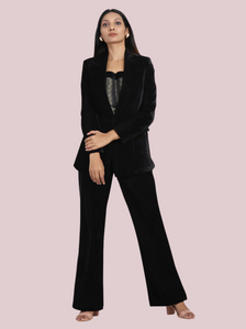 Elegant black velvet pant suit for women, perfect for formal occasions.