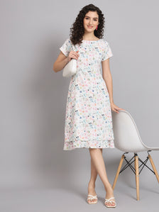 A Line Printed Floral Frill Dress in white with colorful flowers.