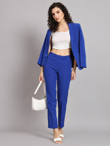 Regular fit ink blue mid waist trousers styled with a crop top.