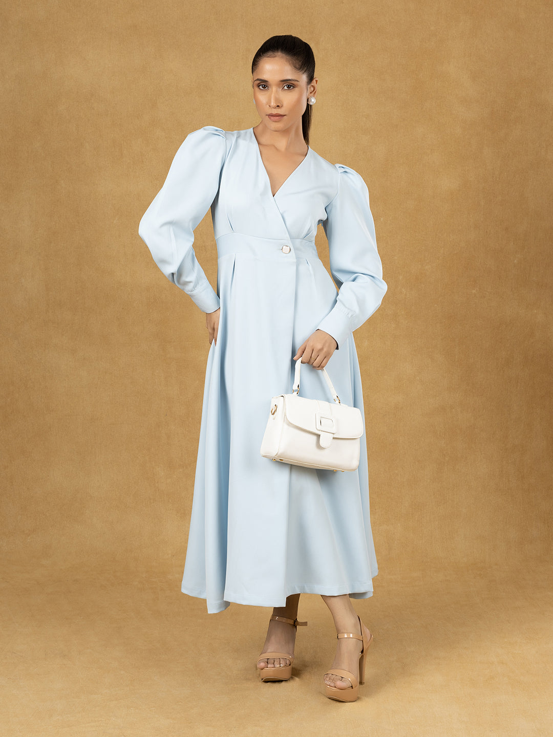 Blue solid wrap fit and flare midi dress with puff sleeves.