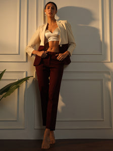 Colour block notched collar pant suit in off white and maroon.