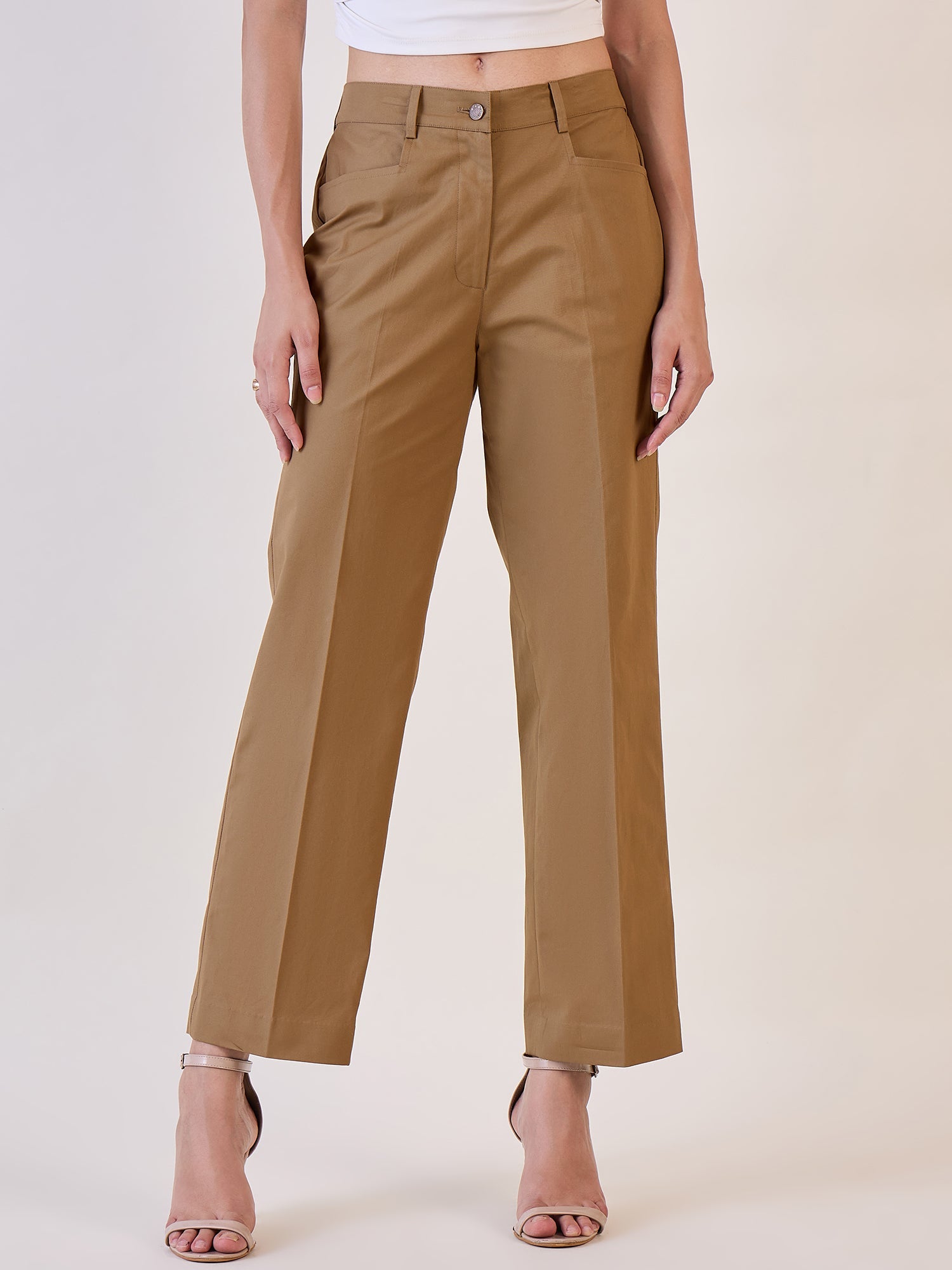 Brown straight fit mid waist trousers for casual and formal wear.