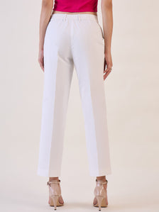 White straight fit mid waist trousers for women, back view.