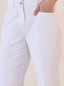 White straight fit mid-waist trousers with pockets for women.