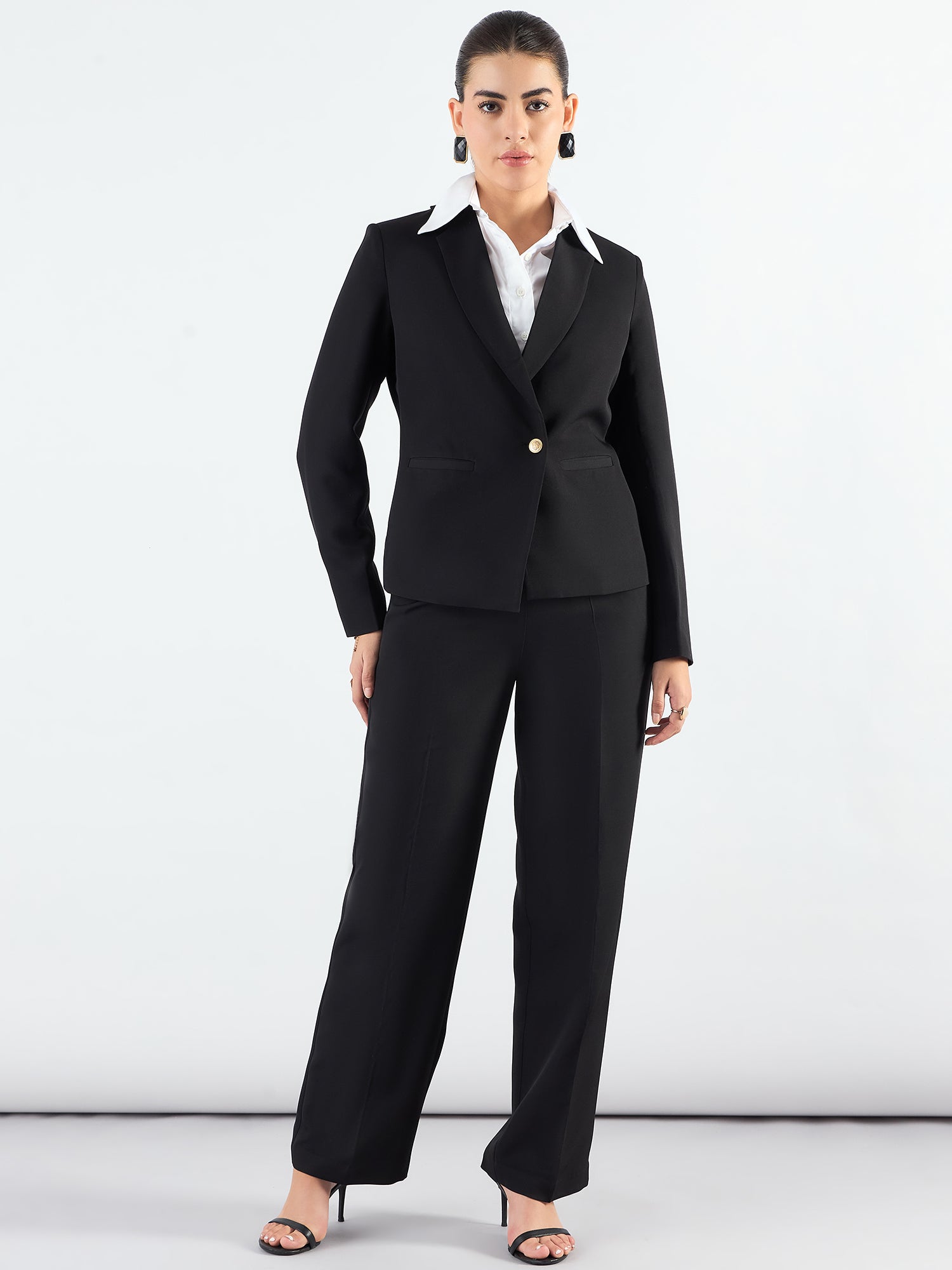 Chic Black Asymmetric Blazer Styled With Fitted Trouser