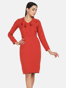 Orange Crepe Stretch Ruffle Dress with long sleeves and elegant design.